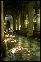 Candles in aisle, Notre-Dame-de-Paris. Paris, France ( color)