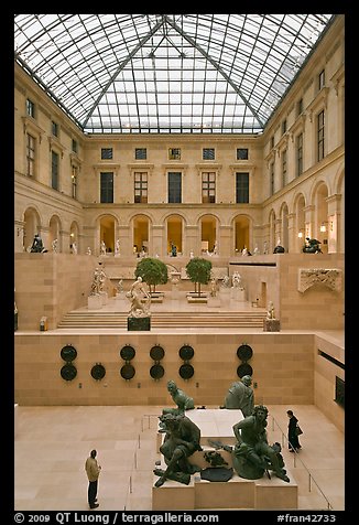 Tourists in the Louvre museum. Paris, France