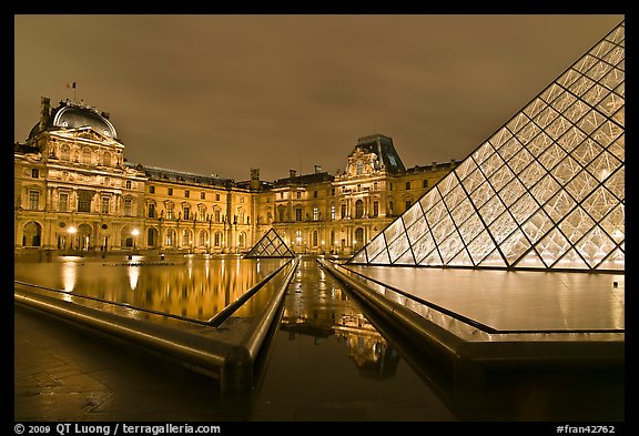 IM Pei Pyramid and Sully Wing at night, The Louvre. Paris, France