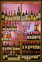 Wine bottles in storefront, passage Vivienne. Paris, France ( color)