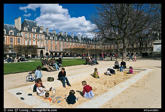 Children playing in sandbox, Place des Vosges. Paris, France (color)