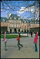 Girls playing with rope, Place des Vosges. Paris, France