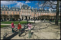 Girls playing in park, Place des Vosges. Paris, France (color)