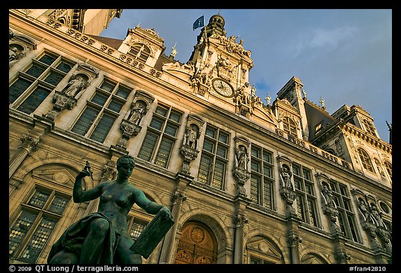 Statue Science by Jules Blanchard and Hotel de Ville at sunset. Paris, France