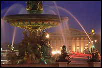 Fountain on Place de la Concorde and Assemblee Nationale by night. Paris, France ( color)