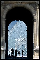 Pyramid seen through one of the Louvre's Gates. Paris, France ( color)