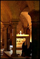 Nun in prayer in the Crypte of the Romanesque church of Vezelay. Burgundy, France ( color)