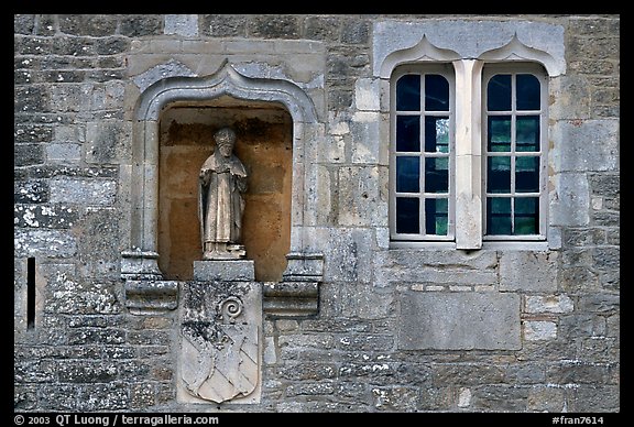 Statue and window, Fontenay Abbey. Burgundy, France (color)