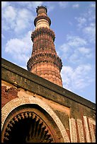 Alai Darweza gate and Qutb Minar tower. New Delhi, India (color)