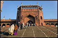 Muslim worshippers climbing  Jama Masjid South Gate. New Delhi, India (color)