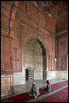 Muslim men praying, prayer hall, Jama Masjid. New Delhi, India (color)