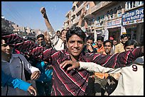 Young men celebrating during wedding procession. Jodhpur, Rajasthan, India ( color)