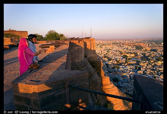 Couple looking at the view from Mehrangarh Fort. Jodhpur, Rajasthan, India (color)