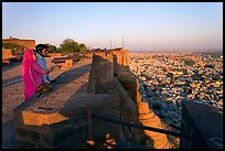 Couple looking at the view from Mehrangarh Fort. Jodhpur, Rajasthan, India ( color)