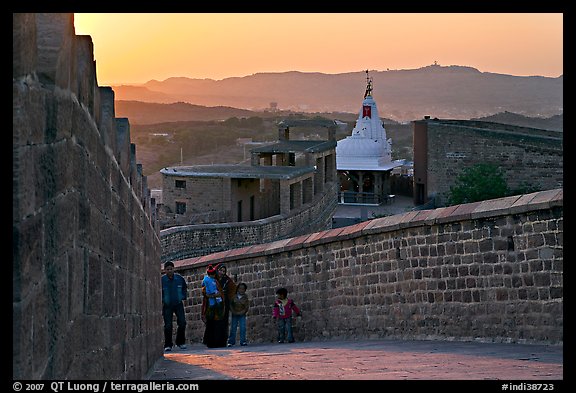 Family atop the walls of Mehrangarh Fort at sunset, Mehrangarh Fort. Jodhpur, Rajasthan, India (color)