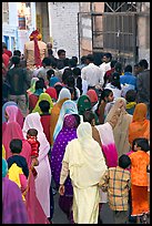 Women following groom during wedding. Jodhpur, Rajasthan, India (color)
