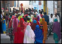 Women in colorful sari in a narrow street during wedding. Jodhpur, Rajasthan, India (color)