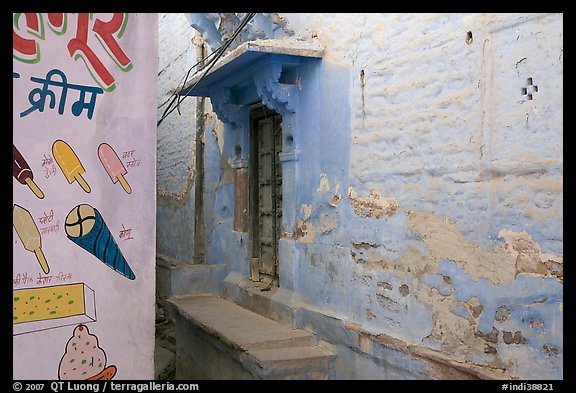 Whitewashed walls with indigo tint and ice-cream depictions. Jodhpur, Rajasthan, India (color)