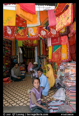 Shop selling colorful Rajasthani fabrics, Sardar market. Jodhpur, Rajasthan, India (color)