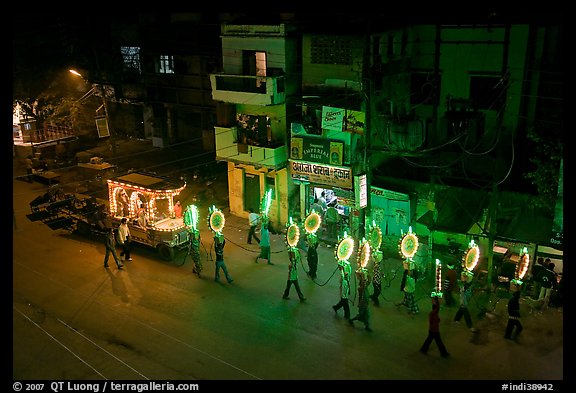 Street wedding procession bright lights seen from above. Varanasi, Uttar Pradesh, India (color)