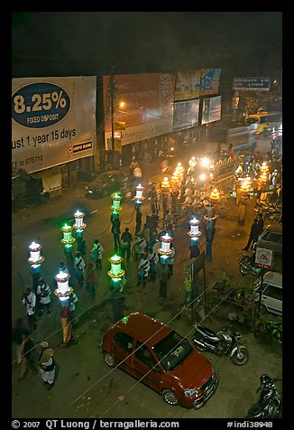 Street and wedding procession by night from above. Varanasi, Uttar Pradesh, India (color)