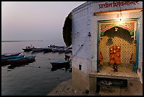 Shrine on the banks of the Ganges River at dawn. Varanasi, Uttar Pradesh, India