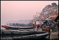 Boats and ghat at sunrise. Varanasi, Uttar Pradesh, India (color)