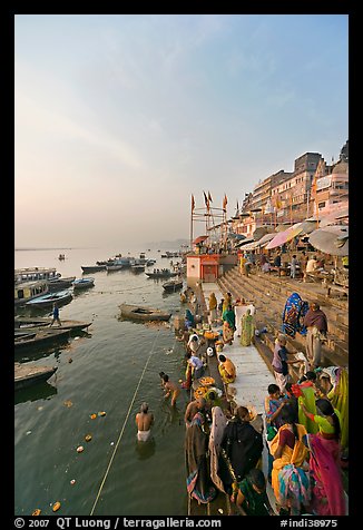 People worshipping Ganges River, early morning. Varanasi, Uttar Pradesh, India (color)