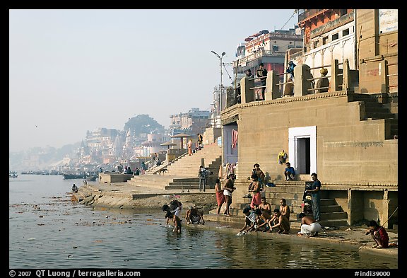 Men dipping in Ganga River at Meer Ghat. Varanasi, Uttar Pradesh, India