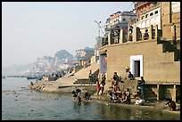 Men dipping in Ganga River at Meer Ghat. Varanasi, Uttar Pradesh, India (color)
