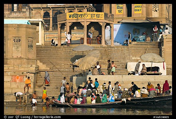Boats loaded with pilgrims and steps, Manikarnika Ghat. Varanasi, Uttar Pradesh, India