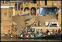Boats loaded with pilgrims and steps, Manikarnika Ghat. Varanasi, Uttar Pradesh, India (color)