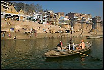 Rowboat in front of Scindhia Ghat. Varanasi, Uttar Pradesh, India (color)