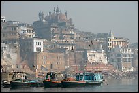 Alamgir Mosque above boats and the Ganges River. Varanasi, Uttar Pradesh, India