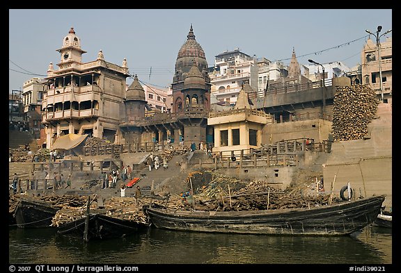 Huge piles of firewood stacked at Manikarnika Ghat. Varanasi, Uttar Pradesh, India (color)