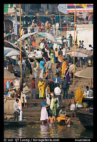 Colorful crowd on steps of Dasaswamedh Ghat. Varanasi, Uttar Pradesh, India