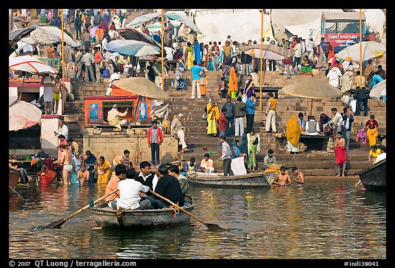 Boats and stone steps leading to Ganga River, Dasaswamedh Ghat. Varanasi, Uttar Pradesh, India