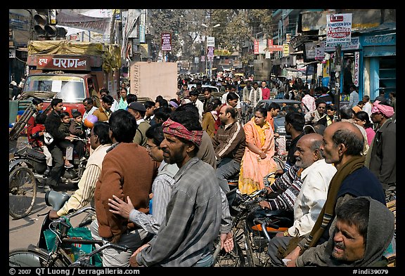 Riders waiting in congested street. Varanasi, Uttar Pradesh, India
