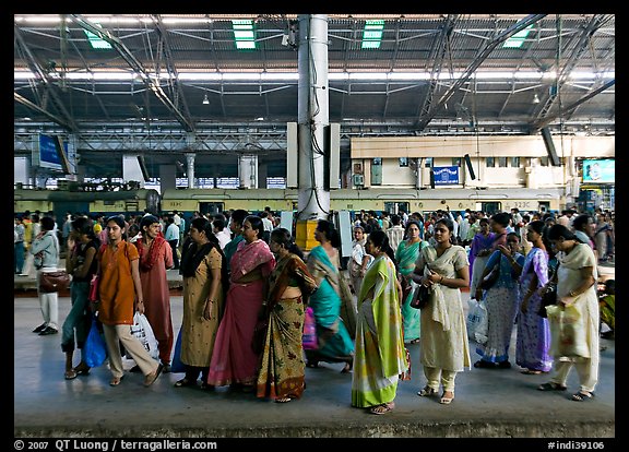Women on train platform, Victoria Terminus. Mumbai, Maharashtra, India (color)