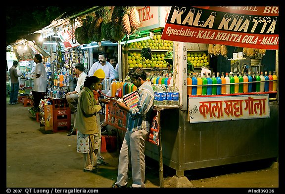 Drinks stall at night, Chowpatty Beach. Mumbai, Maharashtra, India
