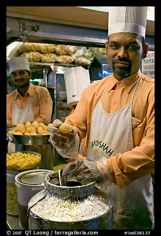 Cooks in food stall, Chowpatty Beach. Mumbai, Maharashtra, India