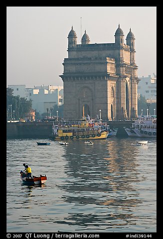 Small boat and Gateway of India, early morning. Mumbai, Maharashtra, India