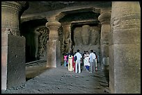 Vistors in main cave, Elephanta Island. Mumbai, Maharashtra, India
