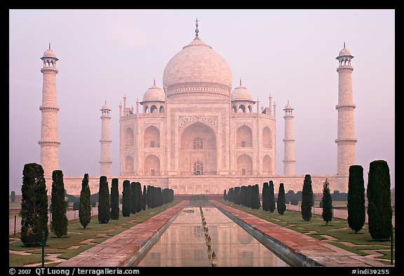 Taj Mahal reflected in watercourse,  sunrise. Agra, Uttar Pradesh, India