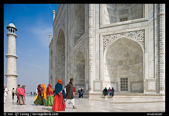 Base of Taj Mahal, minaret, and tourists. Agra, Uttar Pradesh, India