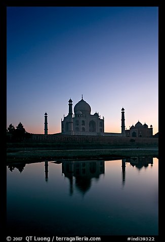 Taj Mahal reflected in  Yamuna River at sunset. Agra, Uttar Pradesh, India (color)