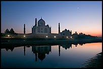 Taj Mahal complex reflected in Yamuna River at sunset. Agra, Uttar Pradesh, India ( color)