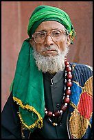 Elderly bespectacled man. Fatehpur Sikri, Uttar Pradesh, India (color)