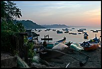 Fishing boats on beach, sunrise. Goa, India (color)