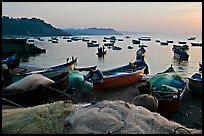 Fishing nets and boats, sunrise. Goa, India (color)